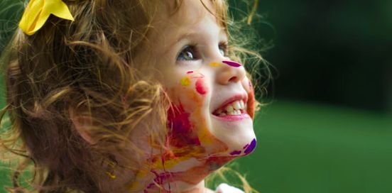 Child Smiling with face paint
