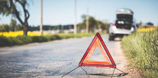car needing assistance on the road