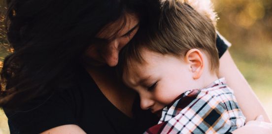 mother comforting child