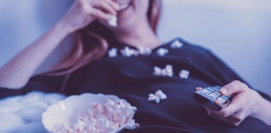 woman eating popcorn