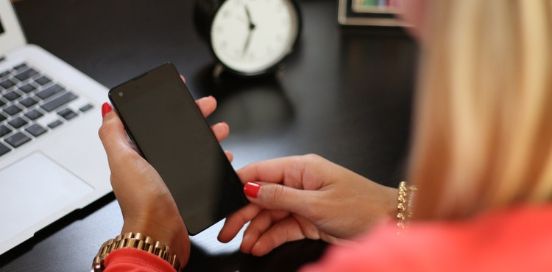 person looking at phone