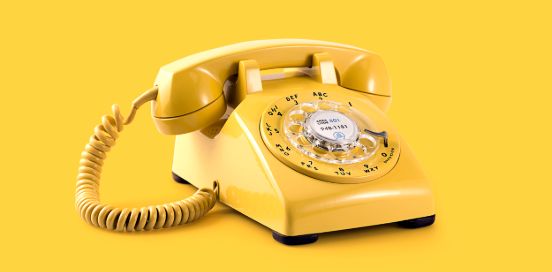 yellow rotary telephone