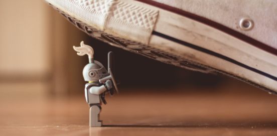 tiny armored lego about to be stepped on