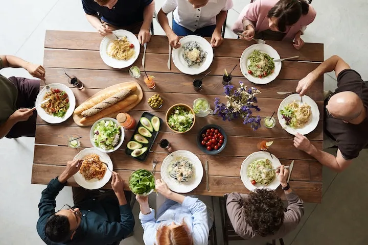Top view of a Family eating together at the table